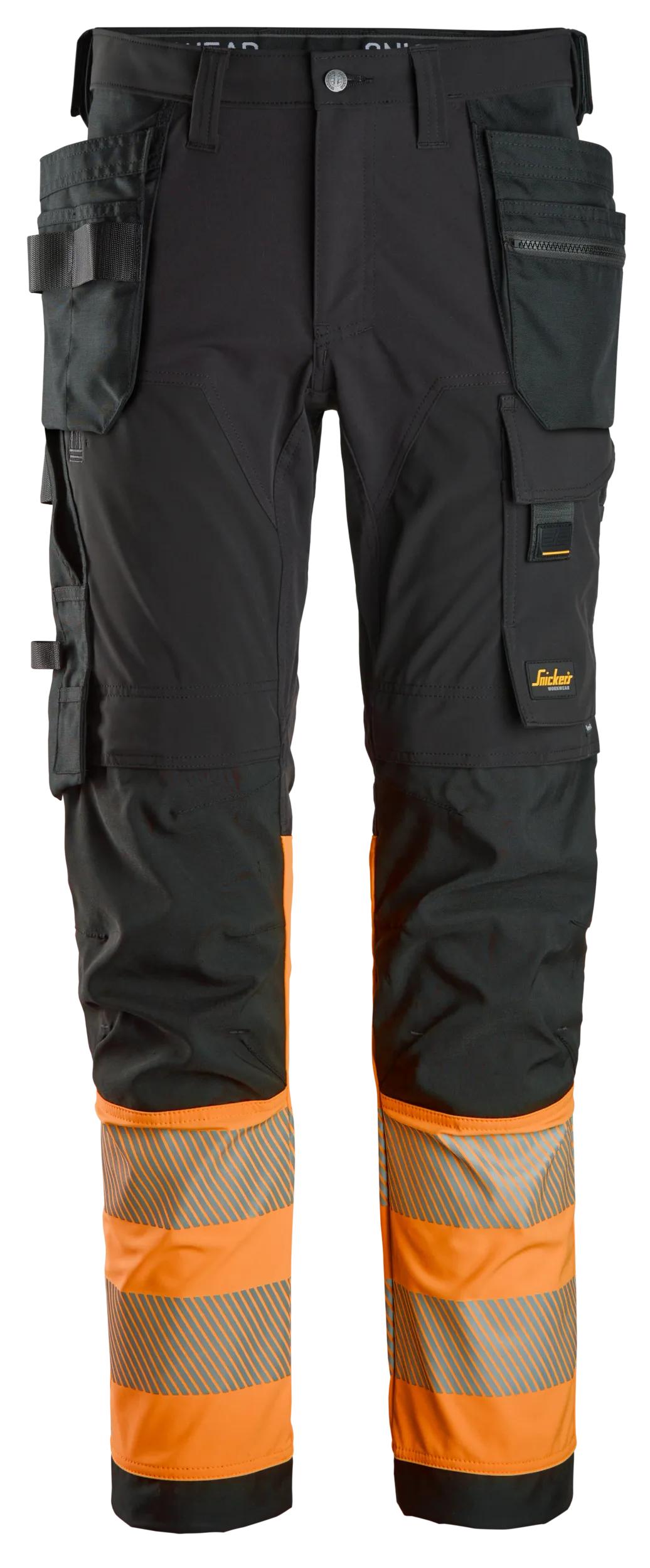 luokka 1, 4-suuntaan joustavat työhousut riipputaskuilla - Black/High Visibility Orange