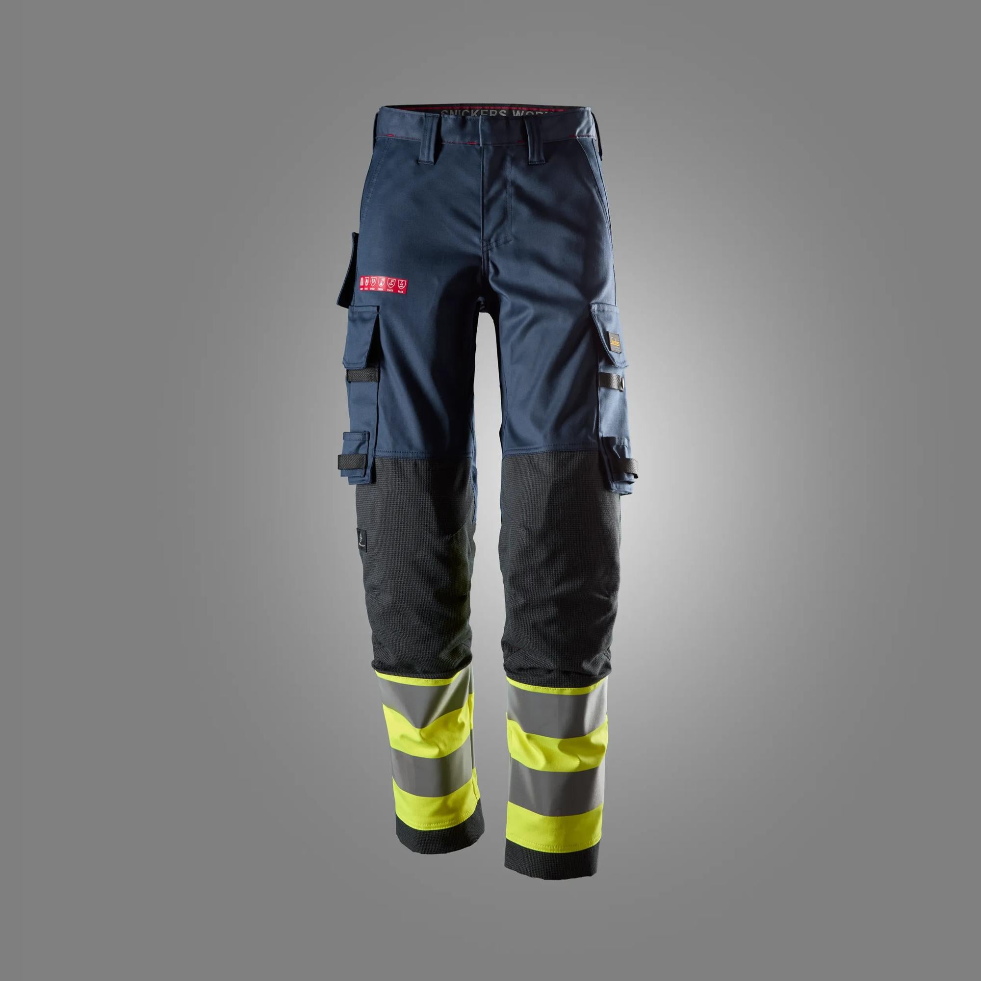 ProtecWork, naisten stretch-huomiohousut, luokka 1 - Navy/High Visibility Yellow